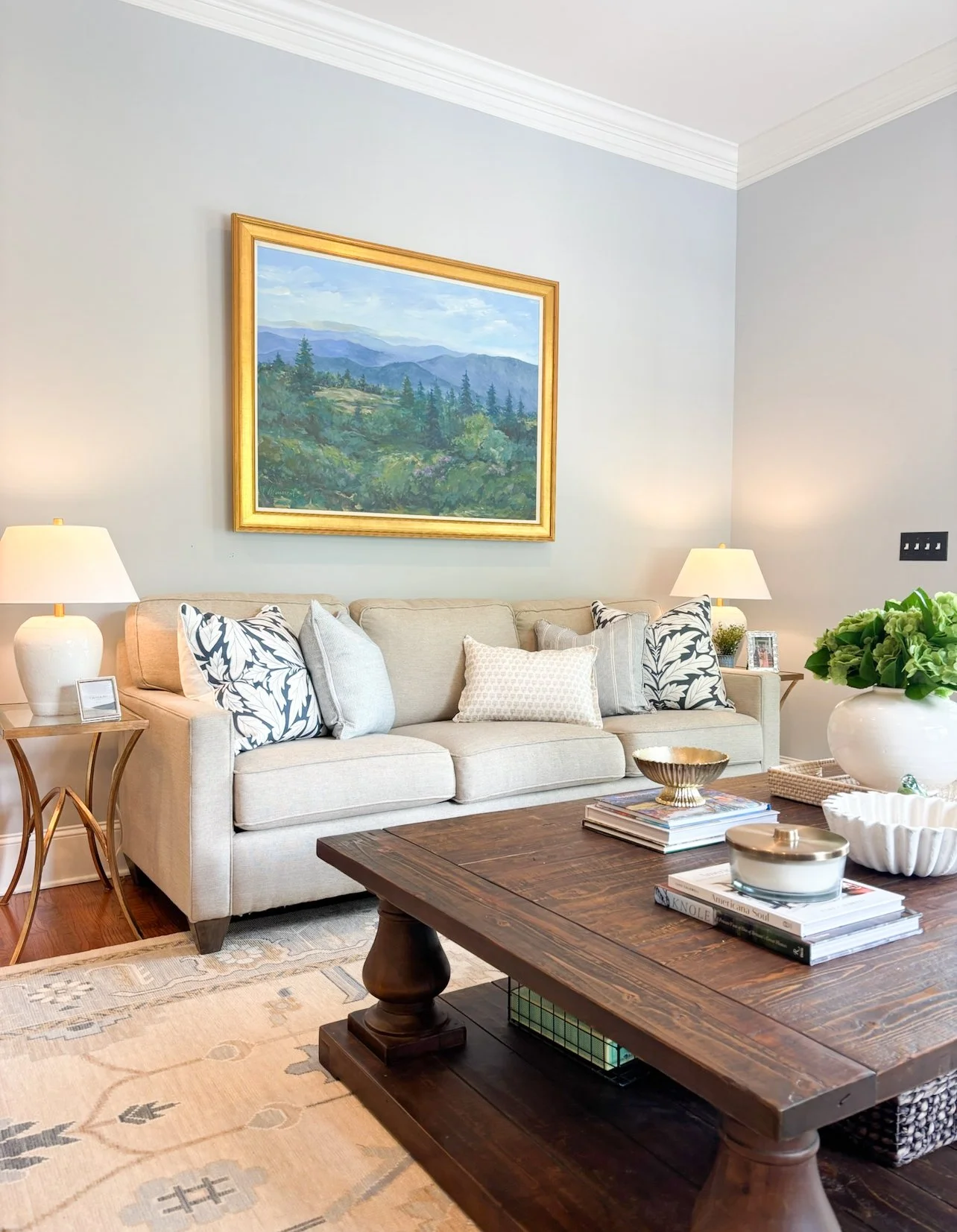 Custom art, custom pillows, side tables, lamps, and styling!
